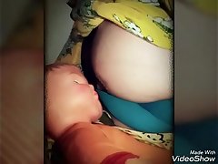 Slide Show of a Desi Horny Booby Babe Breastfeeding her stuff toys